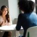 Unsplash-Christina-@wocintechat-femme qui parle-interview-comment trouver un stage en dernière minute