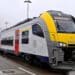 Wikimedia-Commons-Train-de-la-SNCB-Voyager-a-2-pour-le-prix-d1-le-duo-ticket-de-la-SNCB-scaled