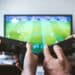 pexels-jeshootscom-jeunes jouant à fifa- article pourquoi l'esport est plus que jamais à la côte