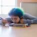 pexels-rdne-etudiante-triste-couchee-sur-table-Comment-relativiser-quand-on-est-decu-de-ses-resultats-dexamens--scaled.jpg